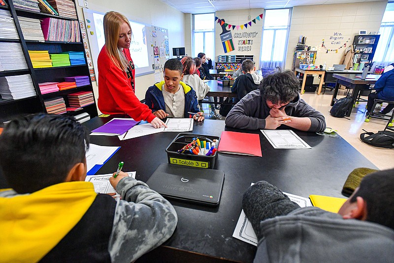 Meagan Rogers teaches Kaiden Davis and other sixth-grade students, Friday, Jan. 27, 2023, inside her art classroom at Darby Middle School in Fort Smith. Fort Smith Public Schools is creating a continuous improvement plan as Vision 2023 comes to an end. Visit nwaonline.com/photo for today's photo gallery.
(NWA Democrat-Gazette/Hank Layton)