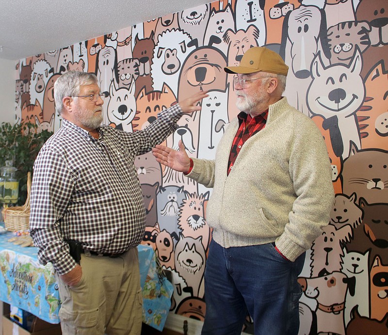 Lynn Kutter/Enterprise-Leader
Dr. Alan Thompson, left, has retired after 36 years with Farmington Veterinary Clinic. He started his practice in a different building with Dr. Randy Chick, right, also a veterinarian at the time.