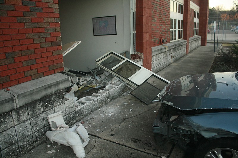 A hole is seen in the USPS office in El Dorado on Monday after a driver crashed through the building. (Matt Hutcheson/News-Times)