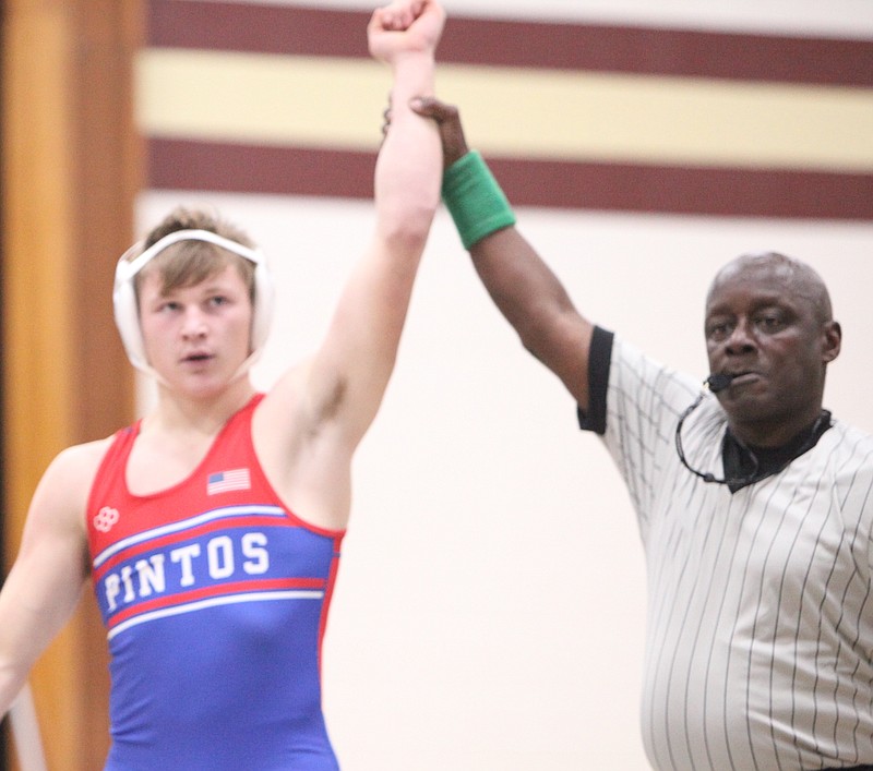 Freshman Tristan Balsley wins his first match of the Eldon Quad against Blair Oaks. (Democrat photo/Evan Holmes)