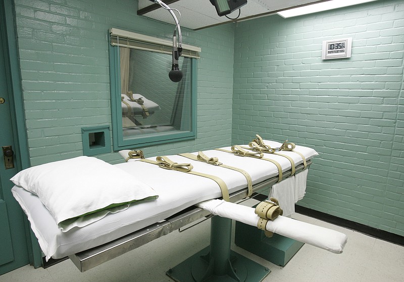 FILE - The state of Texas execution chamber in Huntsville, Texas, is pictured on May 27, 2008. A group of Texas death row inmates filed a federal lawsuit Thursday, Jan. 26, 2023, against the state&#x2019;s prison system over its policy of permanently holding in solitary confinement all prisoners who are awaiting execution. (AP Photo/Pat Sullivan, File)