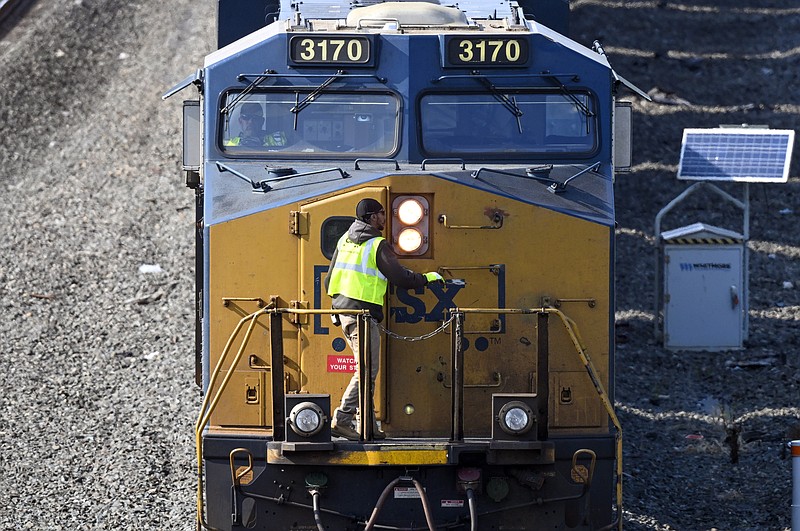 FILE - A locomotive stops to switch tracks before arriving at the Selkirk rail yard Wednesday, Sept. 14, 2022, in Selkirk, N.Y.  The contract imposed on railroad workers last fall didn't resolve their quality-of-life issues, but there have been a couple small hopeful signs this year that the major freight railroads might start to address some of their concerns about demanding schedules and the lack of paid sick time. (AP Photo/Hans Pennink, File)