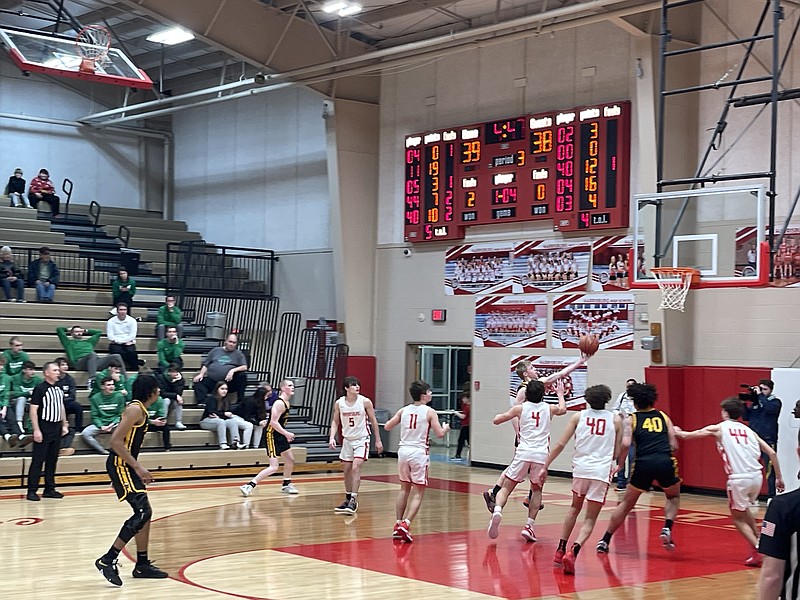 Fulton's Rowdy Gohring goes for a layup against Harrisburg in the championship bracket semifinals of the Harrisburg Tournament Thursday evening at Harrisburg High School. (Fulton Sun/Robby Campbell)