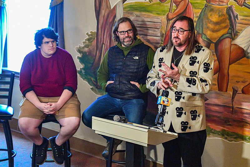 Brandon Goldsmith (right), president of the River Valley Film Society, speaks as festival coordinator Clay Pruitt and University of Arkansas-Fort Smith student Gabe Hobbs listen, Thursday, Jan. 26, 2023, at a press conference for the Fort Smith International Film Festival at Temple Live in downtown Fort Smith. The third annual film festival will return Aug. 25-26. Visit nwaonline.com/photo for today's photo gallery.
(NWA Democrat-Gazette/Hank Layton)