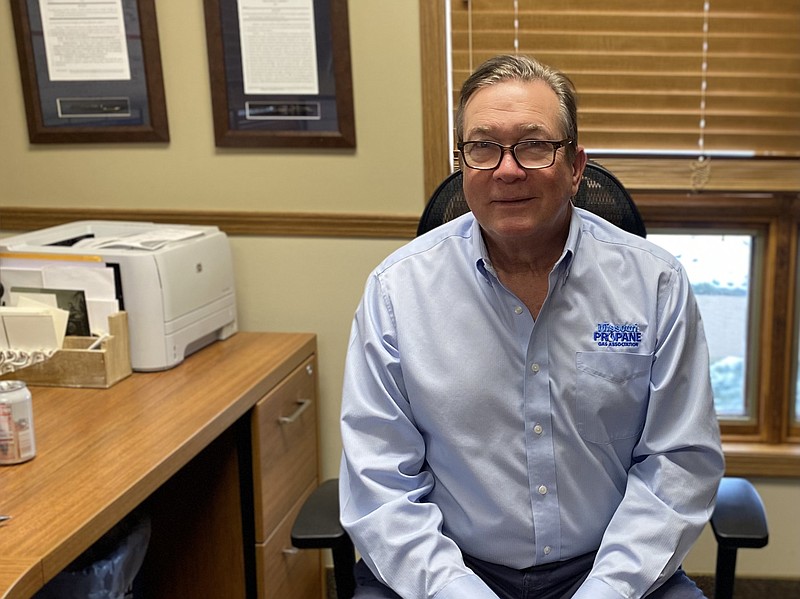 Steve Ahrens, Missouri Propane Gas Association President and CEO, poses behind his desk. (Cameron Gerber/News Tribune)