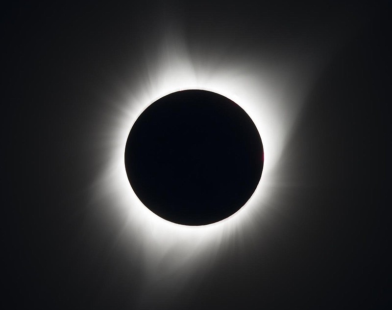 A total solar eclipse is seen Aug. 21, 2017, above Madras, Ore. An eclipse swept across a narrow portion of the contiguous United States from Lincoln Beach, Ore., to Charleston, S.C. A partial solar eclipse was visible across the entire North American continent along with parts of South America, Africa, and Europe. (Special to The Commercial/NASA/Aubrey Gemignani)