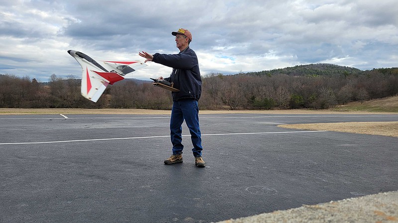 Jack Hord throws his favorite RC plane into the air to begin a flight Saturday morning. Photo by Lance Brownfield.