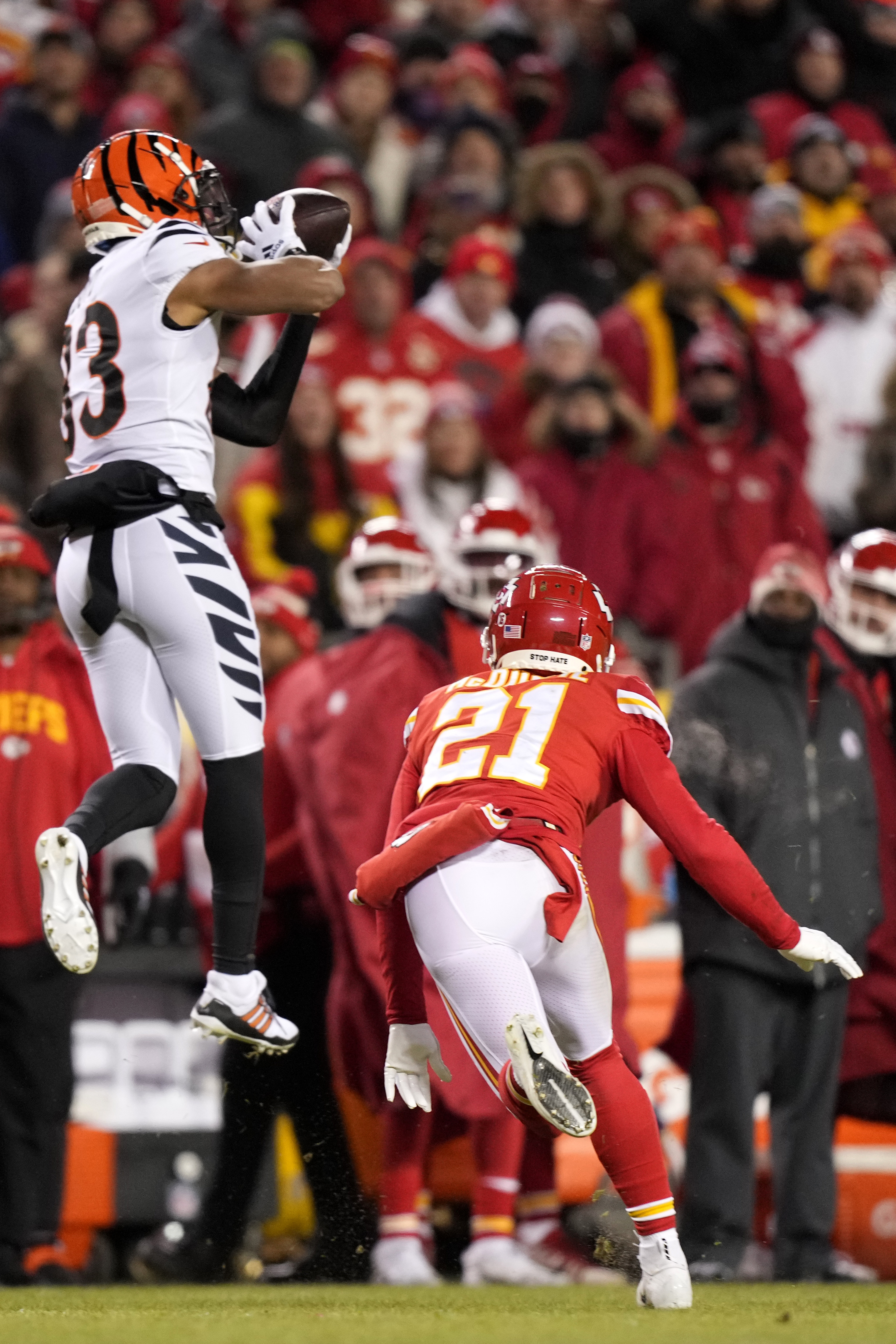 Cincinnati Bengals free safety Jessie Bates (30) and Mike Hilton celebrate  after breaking up a pass during the first half of an NFL football game  against the Kansas City Chiefs, Sunday, Jan.