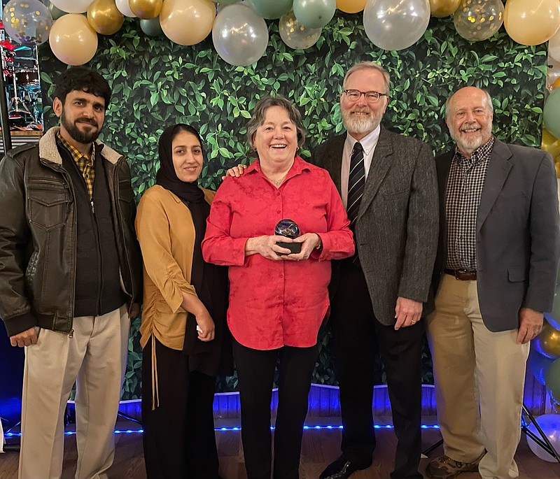 Submitted photo
Members of the Fulton Rotary Club and the Fulton Afghan Resettlement Committee pose with the J.H. Atkinson Award at the Callaway Chamber of Commerce Banquet. From left to right: Sardar Sherzad, Breshna Sherzad, Joan Morris, Bob Sterner and Bob Hansen. Sardar and Breshna moved to Fulton from Afghanistan 15 years ago, and serve as consultants to the Afghan Resettlement Committee.
