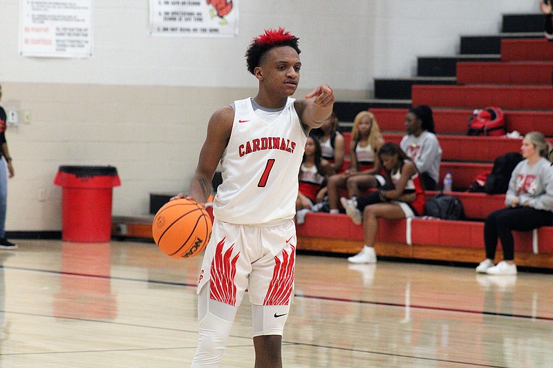 Photo By: Michael Hanich
Camden Fairview guard JyMarion Hopson sets up a play in the game against Hope.