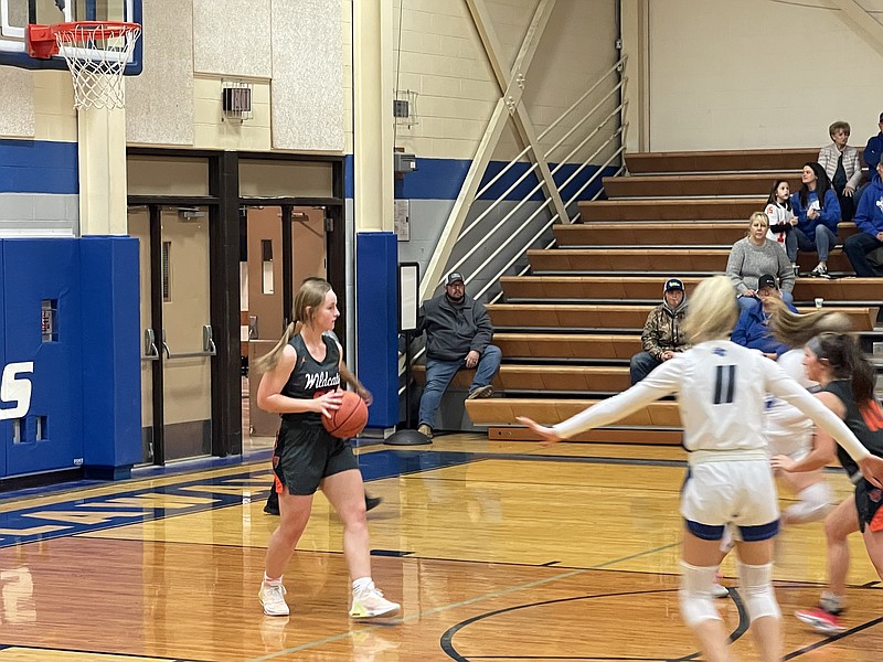 New Bloomfield's Macie Abbott dribbles the ball after collecting a rebound against South Callaway Monday at South Callaway's gym in Mokane. (Fulton Sun/Robby Campbell)