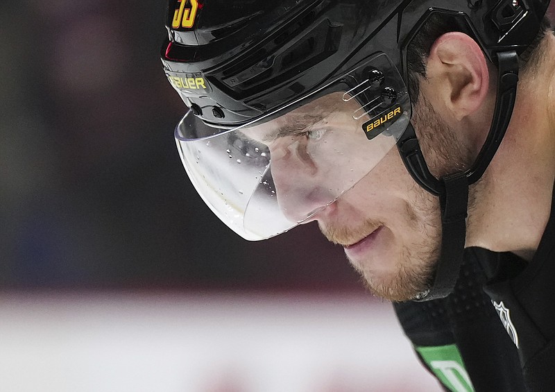 Vancouver Canucks' Bo Horvat prepares to take a faceoff during the third period of the team's NHL hockey game against the Chicago Blackhawks on Tuesday, Jan. 24, 2023, in Vancouver, British Columbia. (Darryl Dyck/The Canadian Press via AP)