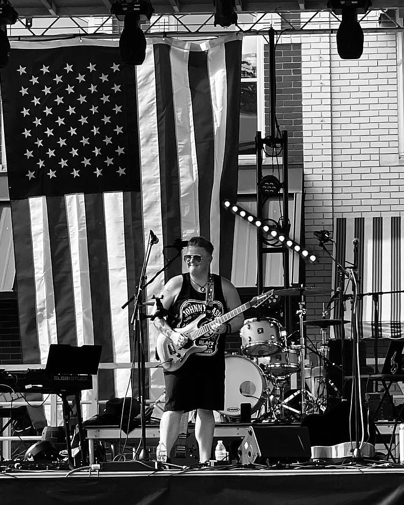 "I have a guitar that I play the national anthem with, a guitar that’s good for country music," Erin Detherage says of her guitar collection. The local musician, affectionately referred to as Dr. Shred, counts 10 guitars in her collection. Her favorite is a purple Ibanez she calls Camille. 
(Courtesy Photo)