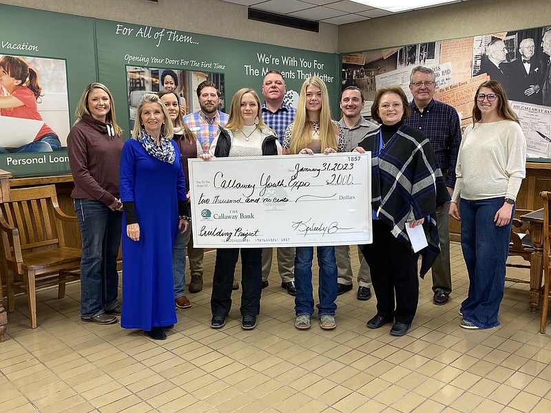 Anakin Bush/Fulton Sun photo:
Members of the Callaway Youth Expo hold a check for $2,000 presented to them by the Callaway Bank. The goal of the project is $300,000, and almost half of the goal has been raised.