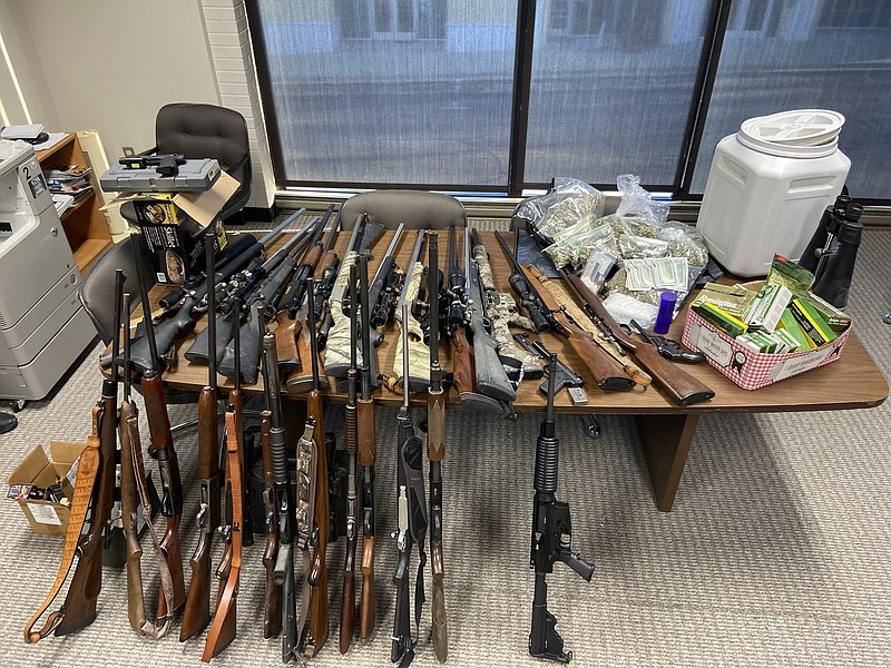 Drugs, guns and cash were seized by the 13th Judicial District Drug Task Force and other local law enforcement agencies this week. DTF Director Jonathan Messer said the items pictured were seized in the Union County area. (Courtesy of 13th Judicial Drug Task Force/Special to the Camden News)