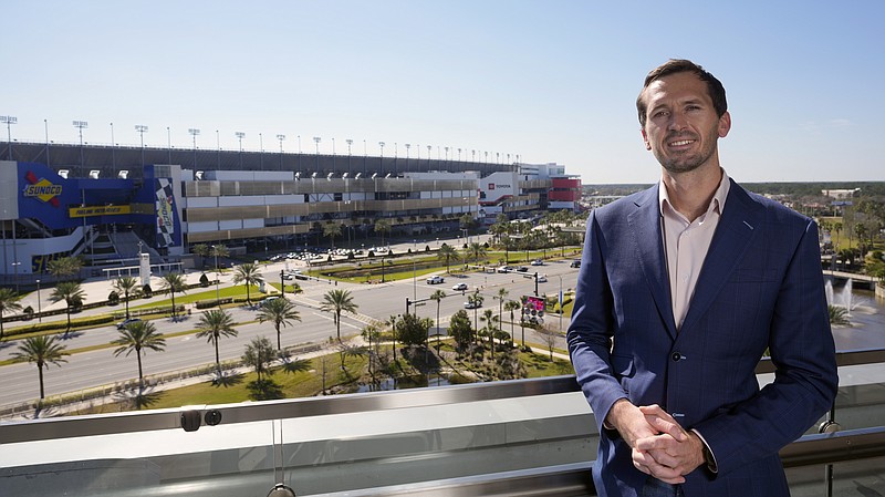 Ben Kennedy, NASCAR Senior Vice President of Racing Development and Strategy for NASCAR at his offices overlooking Daytona International Speedway, Friday, Jan. 27, 2023, in Daytona Beach, Fla. (AP Photo/John Raoux)