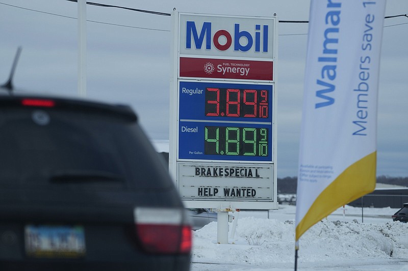 Gas prices are displayed at a Mobil gas station in Prospect Heights, Ill., Sunday, Jan. 29, 2023. (AP Photo/Nam Y. Huh)