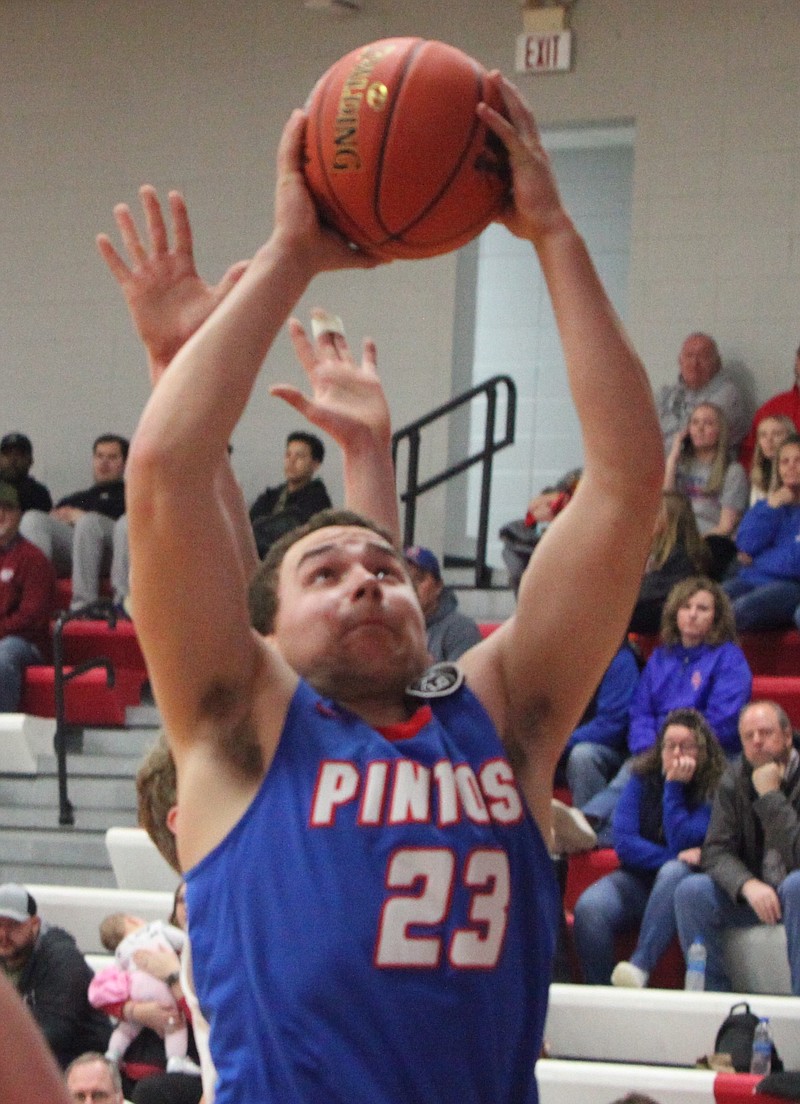 Despite getting into early foul trouble, senior center Hunter Berendzen had 10 points and eight rebounds against Warrensburg. (Democrat photo/Evan Holmes)