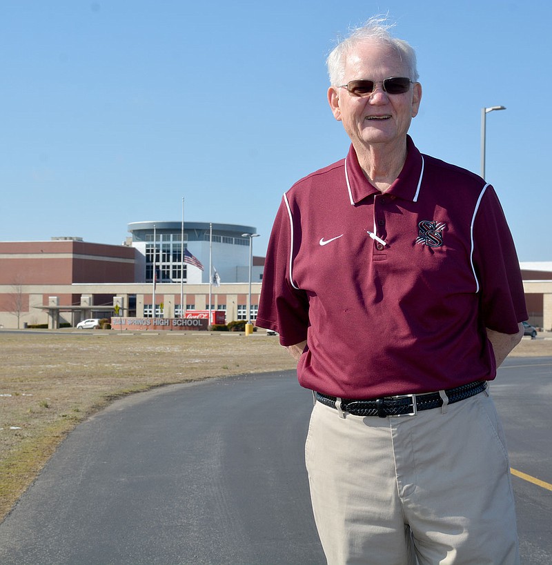 Ken Ramey, former superintendent of the Siloam Springs School District, stands recently in front of Siloam Springs High School.

(NWA Democrat-Gazette/Graham Thomas)