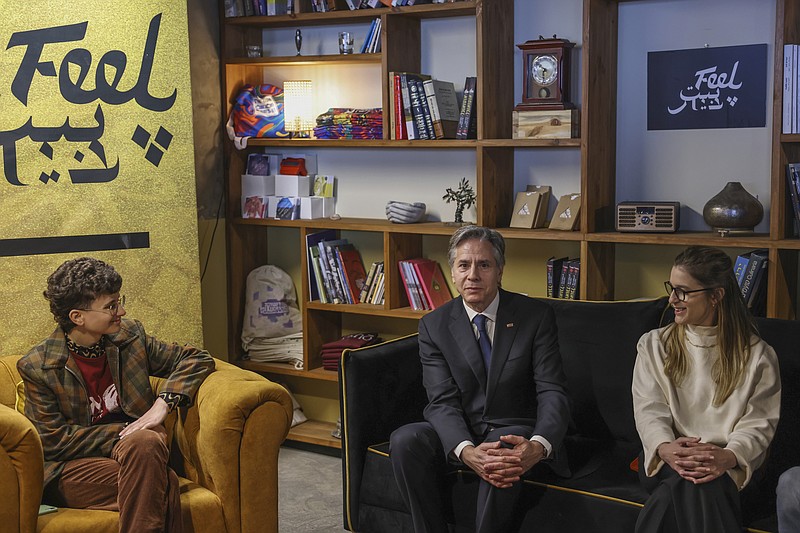 US Secretary of State Antony Blinken, center, meets with Israeli emerging leaders at "Feel Beit", an Israeli-Palestinian art and culture collective in Jerusalem, Tuesday Jan. 31, 2023. (Ronaldo Schemidt/Pool via AP)