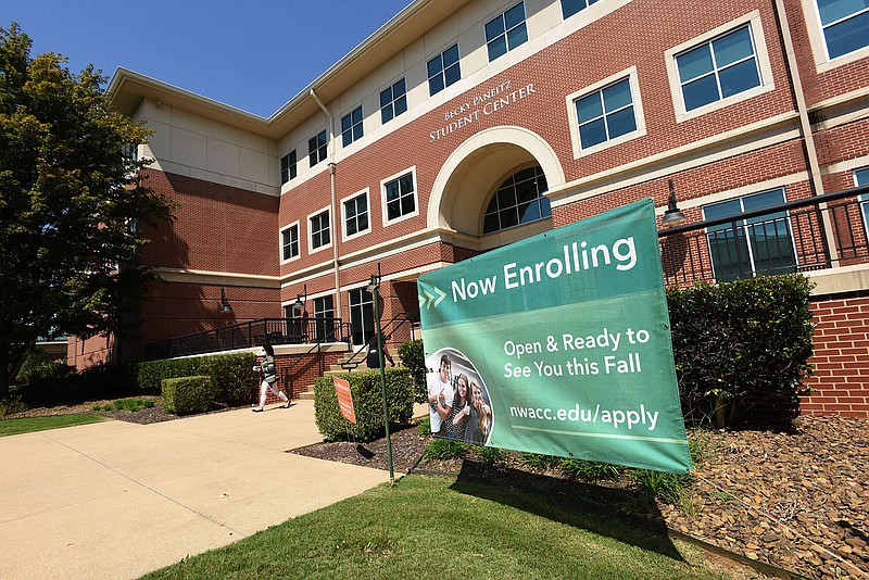 A sign outside the Becky Paneitz Student Center on Tuesday Sept. 7 2021 advertises enrollment at Northwest Arkansas Community College. (NWA Democrat-Gazette/Flip Putthoff)