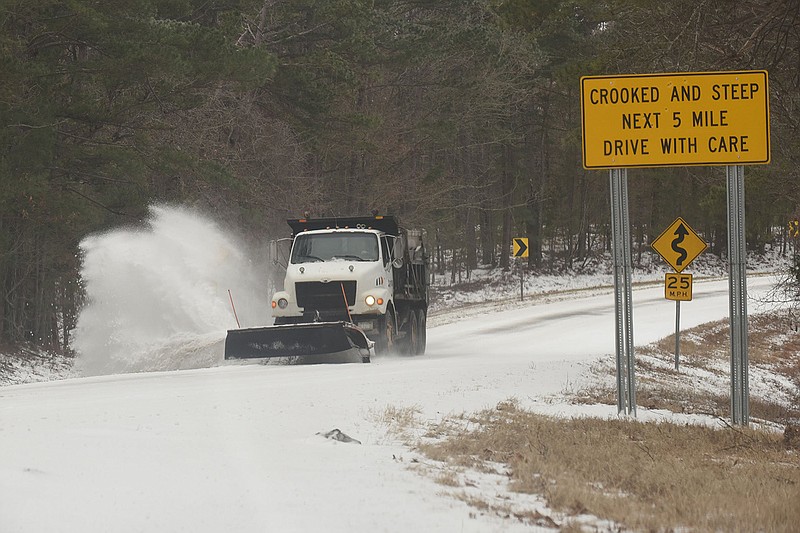 CLEARING THE WAY
Arkansas Department of Transportation on Tuesday Jan. 31 2023 plows Arkansas 12 in east Benton County. Go to nwaonline.com/photos for today's photo gallery.
(NWA Democrat-Gazette/Flip Putthoff)