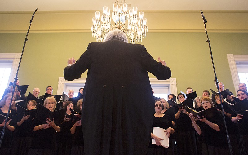 John Erwin conducts the Arkansas Chamber Singers in December 2015. (Democrat-Gazette file photo)