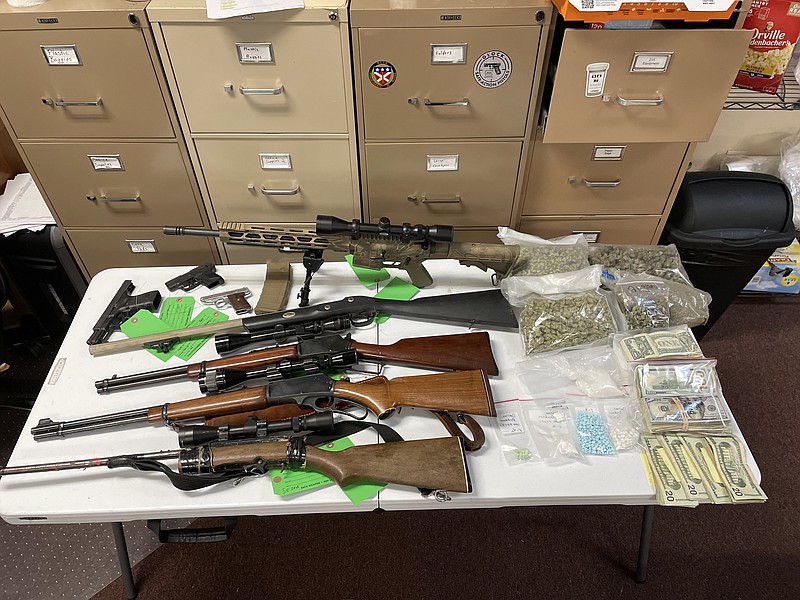Drugs, guns and cash were seized by the 13th Judicial District Drug Task Force and other local law enforcement agencies this week. DTF Director Jonathan Messer said the items pictured were seized in the Union County area. (Courtesy of 13th Judicial Drug Task Force/Special to the News-Times)