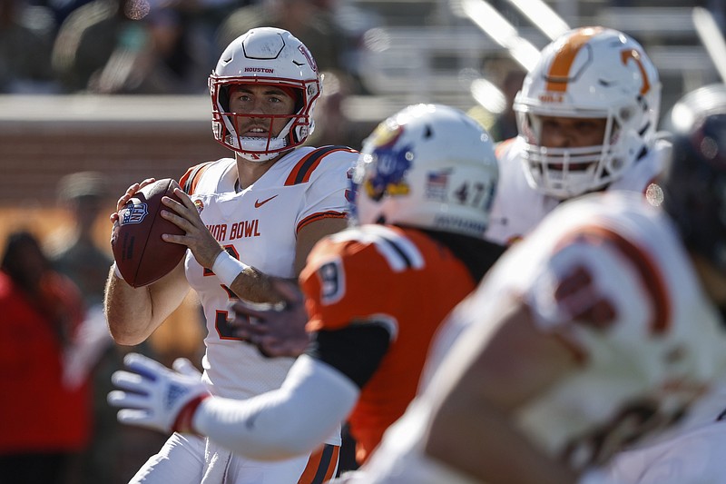 American quarterback Clayton Tune of Houston (3) looks to pass during the first half of the Senior Bowl NCAA college football game Saturday, Feb. 4, 2023, in Mobile, Ala.. (AP Photo/Butch Dill)