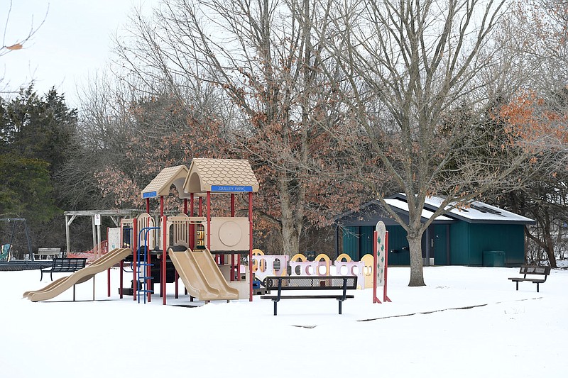 Playground equipment stands Thursday, Feb. 2, 2023, at Gulley Park in Fayetteville. The Fayetteville City Council is expected to approve more than $1.3 million for work at to improve the park, including a new playground, splash pad and pavilion. Visit nwaonline.com/photo for today's photo gallery. 
(NWA Democrat-Gazette/Andy Shupe)