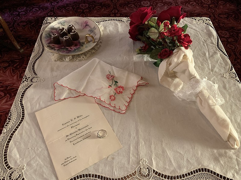 “For the exhibit we have a number of interesting artifacts that help illustrate what an early 1900s courtship might have been like,” says Rachel Smith, assistant director of the Rogers Historical Museum and curator of the “Etiquette of Courtship” exhibit in the Hawkins House. “We have a small collection of historic Valentines cards, as well as sheet music for love songs, and women’s magazines from the period. We also have a wedding announcement from 1910, and a wedding dress from 1908 that would have made part of the woman’s trousseau — the items she took with her when she married. All of these give us a glimpse into ideas about love and courtship in the early 1900s.”

(Courtesy Photos/RHM)