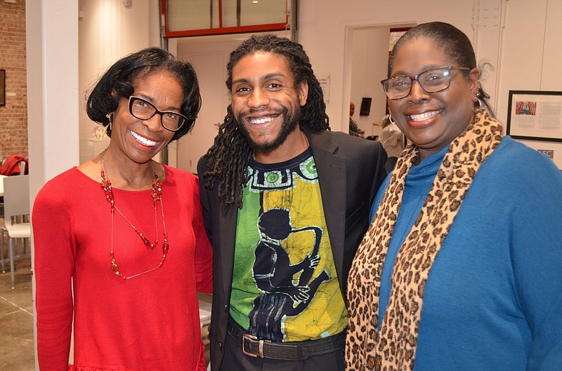 Trudy Redus (left) and Anissa Buckner (right) visited with Damen Tolbert during a break between sets. Redus helped found Live@5 concerts 20 years ago while Buckner, then Tolbert's teacher, once tried to convince him to change his college major from music to biology. (Special to The Commercial/Richard Ledbetter)