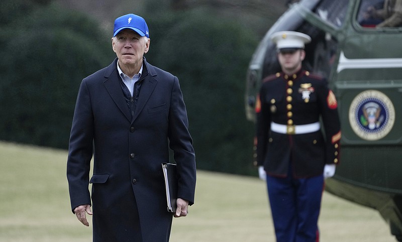 President Joe Biden walks off of Marine One on the South Lawn of the White House in Washington, Monday, Feb. 6, 2023, after returning from a weekend at Camp David in Maryland. (AP Photo/Susan Walsh)