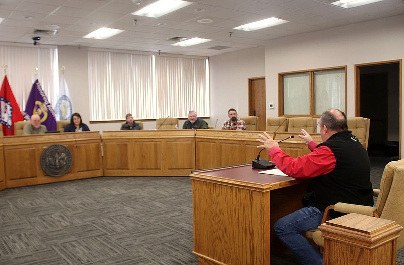 Lynn Kutter/Enterprise-Leader Farmington Mayor Ernie Penn addresses the new board of directors for Washington Water Authority on Feb. 6 at the Washington County Courthouse. Penn was giving an update on the status of the state and city project to widen two miles of Arkansas Highway 170.