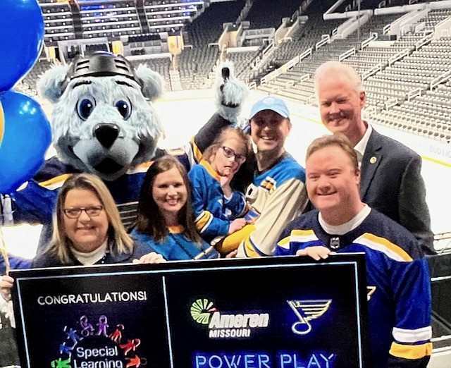 Submitted photo: 
A contingent of Jefferson City residents were on hand to learn that the Special Learning Center had won the contest from the St. Louis Blues through the Ameren Missouri Power Play Goals. Along the back row are (from left) Kristen Hartman, Kennedy Hartman, Kevin Hartman and Todd Mayfield. Along the front are Stephanie Johnson, executive director of Special Learning Center, and Elijah Mayfield.