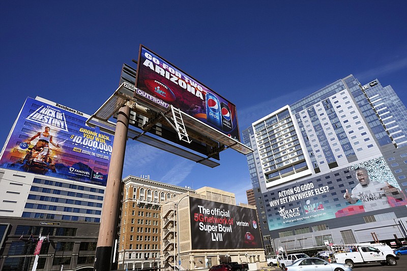 Super Bowl Ads Preview Football
Large advertisements adorn buildings and electronic billboards leading up to the NFL Super Bowl LVII football game in Phoenix, Friday, Feb. 3, 2023. (AP Photo/Ross D. Franklin)