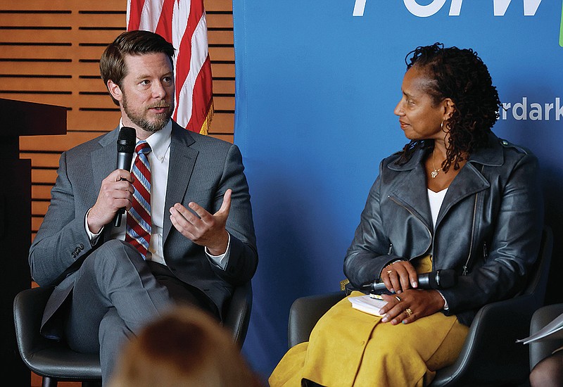 Ben Kutylo (left), executive director of Forward Arkansas, talks about the ÒState of Education in ArkansasÓ Statewide Survey and Engagement Process released by Forward Arkansas as Sherece West-Scantlebury (right), president and CEO of the Winthrop Rockefeller Foundation, listens during a panel discussion about the survey on Tuesday, Feb. 7, 2023, during the The Rotary Club of Little Rock meeting at the Clinton Presidential Library. 
(Arkansas Democrat-Gazette/Thomas Metthe)