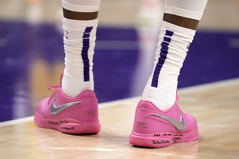 Los Angeles Lakers forward LeBron James' shoes are seen during the first half of an NBA basketball game against the Oklahoma City Thunder Tuesday, Feb. 7, 2023, in Los Angeles. (AP Photo/Ashley Landis)