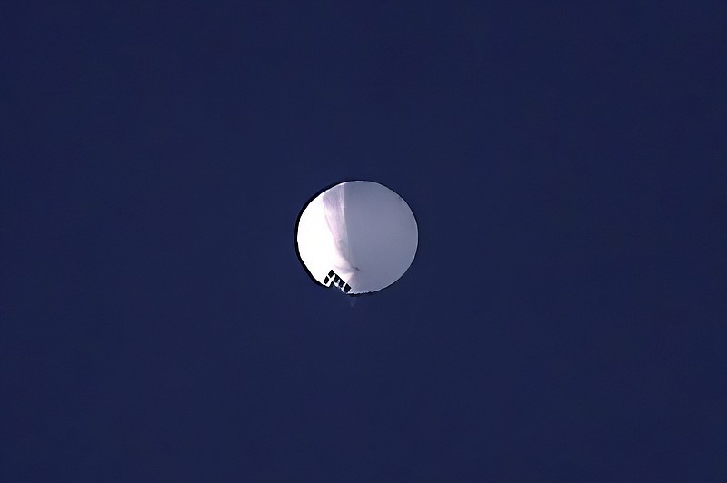 A high altitude balloon floats over Billings, Mont., on Wednesday, Feb. 1, 2023. The huge, high-altitude Chinese balloon sailed across the U.S. on Friday, drawing severe Pentagon accusations of spying and sending  excited or alarmed Americans outside with binoculars. Secretary of State Antony Blinken abruptly canceled a high-stakes Beijing trip aimed at easing U..S.-China tensions.(Larry Mayer/The Billings Gazette via AP)