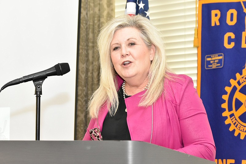 Misti Coker speaks to the Pine Bluff Rotary Club about the Personal Pep Rally and its Endure the Dirt fundraiser during the club's Tuesday luncheon at the Pine Bluff Country Club. (Pine Bluff Commercial/I.C. Murrell)