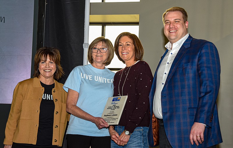 Julie Smith/News Tribune
Stephanie Lehmen, second from right,  was the recpient of this year's Linda McAnany Outstanding Volunteer Award. Pictured with Lehmen are United Way President Ann Bax, at left, Sharon Campbell, incoming board chair and Andy Fechtel, outgoing board chair.