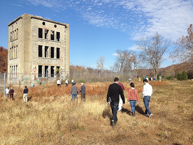 Participants in the Historic Preservation Alliance of Arkansas' 2012 Northwest Arkansas Ramble explore in 2012 the remnants of Oklahoma Tower at the Monte Ne Historic site.
(Submitted Photo)