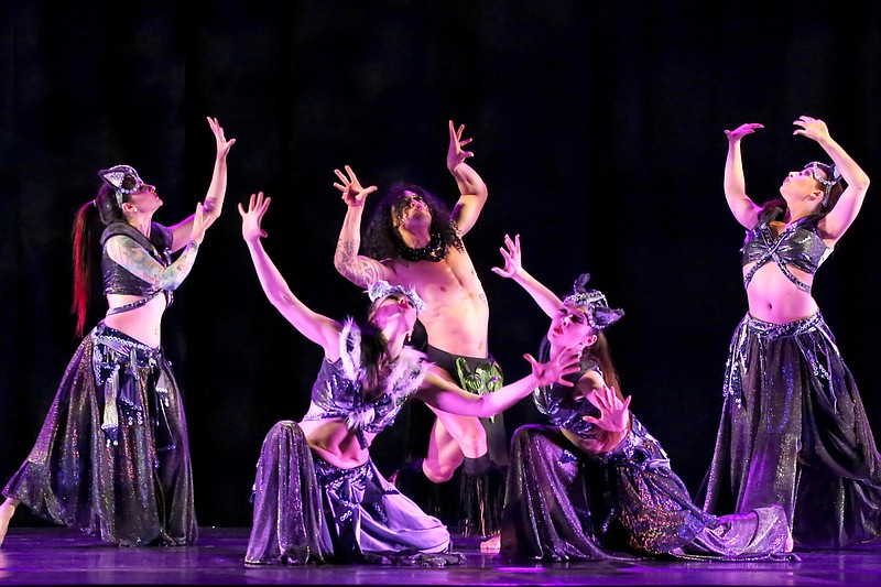 BDE Evolution dancers form the Wolf Pack in "The Jungle Book." (Special to the Democrat-Gazette/Andre Elbing)