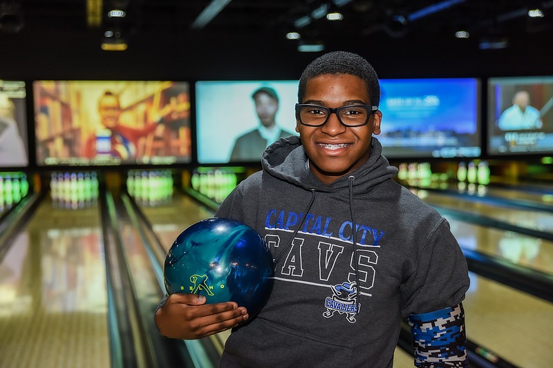 Julie Smith/News Tribune
Jaylen Jamison demonstrates his technique at Strikers, where he is the first person to bowl a perfect game.