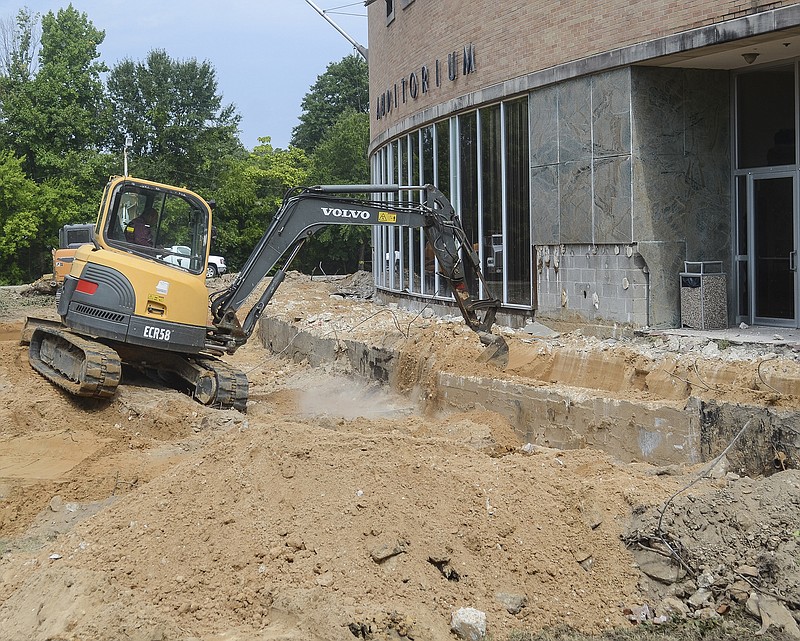 In this 2015 file photo, construction work is performed at the El Dorado Municipal Auditorium. The auditorium parking lot will be re-paved this month. (News-Times file)
