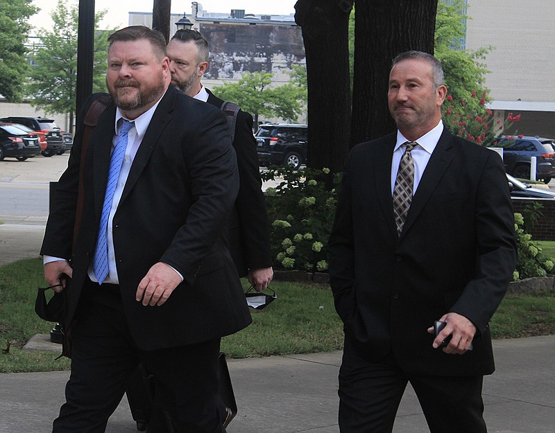 Franklin County Sheriff Anthony Boen (right) walks into the federal courthouse for the Western District of Arkansas on Monday, Aug. 2, 2021, with his attorneys, Russell Wood (left) and Paul Prater (center), in Fort Smith. 
(File Photo/NWA Democrat-Gazette)