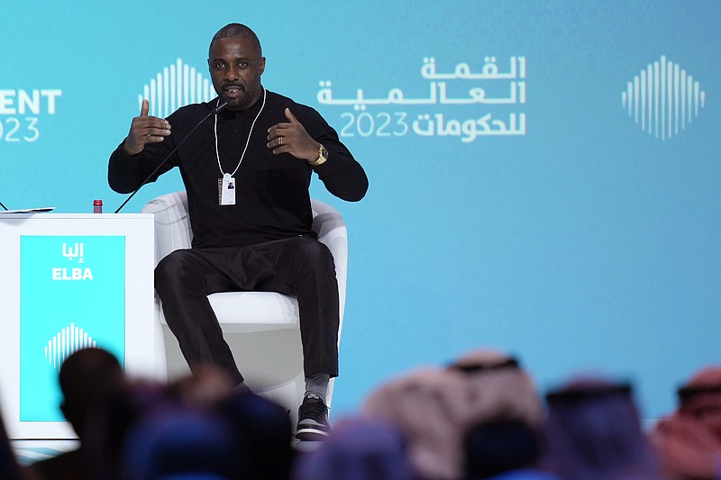 British actor Idris Elba speaks during the World Government Summit in Dubai, United Arab Emirates, Tuesday, Feb. 14, 2023. While on stage, Elba brought up the persistent discussions about him taking over as Ian Fleming's famed British spy 007. (AP Photo/Kamran Jebreili)