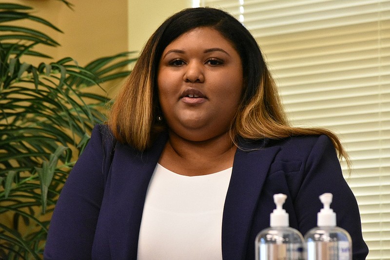 Ka'Lisa Stanfield talks to members of the Southeast Arkansas College community during a public forum introducing her as a candidate for athletic director and dean of students Wednesday at the college's Welcome Center. (Pine Bluff Commercial/I.C. Murrell)