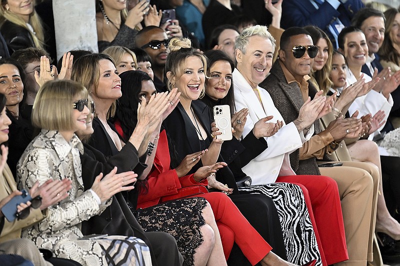Anna Wintour, from left, Savannah Guthrie, Mindy Kaling, Kate Hudson, Katie Holmes, Alan Cumming and Don Lemon attend the Michael Kors Fall/Winter 2023 fashion show on Wednesday, Feb. 15, 2023, in New York. (Photo by Evan Agostini/Invision/AP)