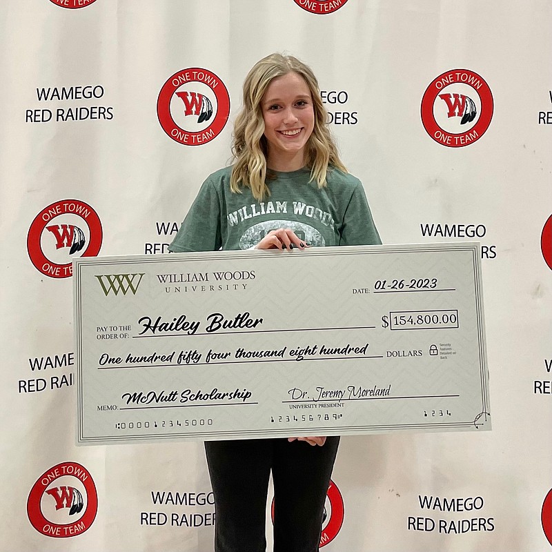 Photo courtesy William Woods University
Hailey Butler holds a check worth $154,800, the amount of the Amy Shelton McNutt Scholarship at William Woods University. This scholarship is the largest offered by the college.